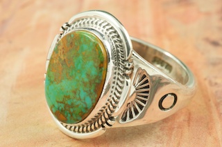 Genuine Crow Springs Turquoise set in Sterling Silver Ring. The Crow Springs Mine is located near Tonopah, Nevada. Created by Navajo Artist John Nelson. Signed by the artist.